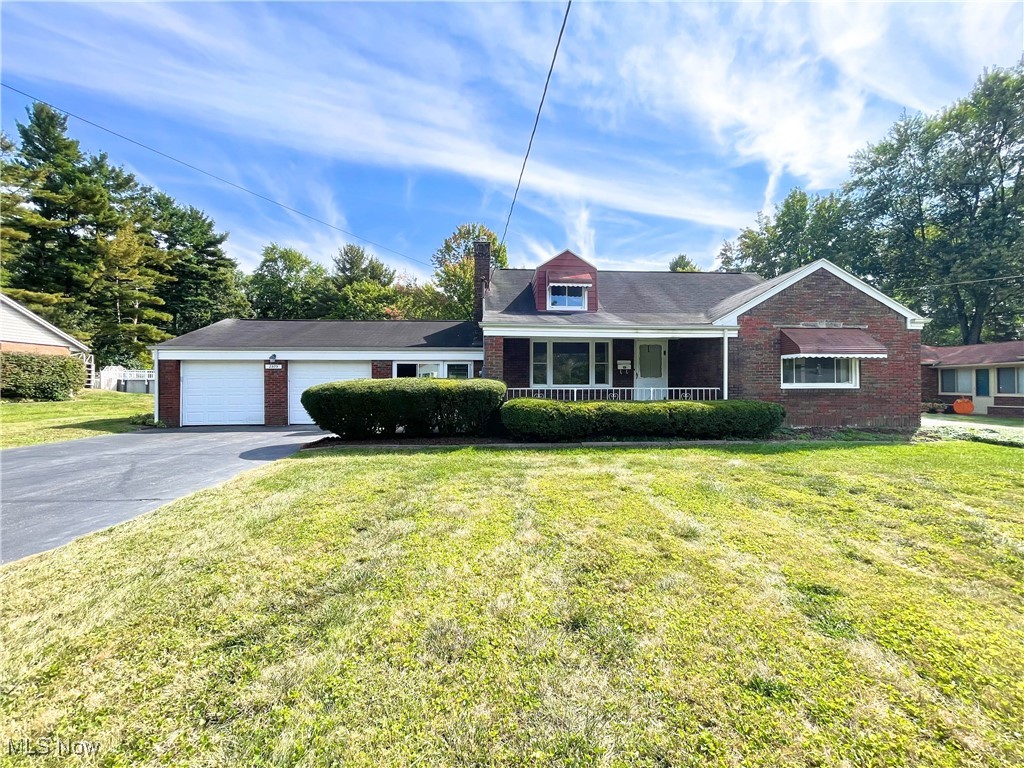 Welcome home to this 3-4 bedroom, 2.5 bath brick home in Poland on over .5 acres. From the moment you step onto the welcoming covered front porch, you'll be captivated by its character. Inside, the spacious living room features original hardwood floors, a fireplace (sellers never used), and an arched doorway. The eat-in kitchen offers oak cabinetry, ceramic tile floors, and comes equipped with a stove and refrigerator (unknown if the dishwasher works), plus a charming built-in china cabinet in the hallway. The first-floor master bedroom and an additional bedroom, both with hardwood floors and generous closets, share a full bath with a tub/shower combo. Upstairs, you'll find two (tandem) bedrooms with hardwood floors—one featuring a built-in desk, and the other offering two closets and a half bath. The partially finished basement offers a rec room complete with a bar and another full bath. Many of the windows have been replaced in this home The enclosed breezeway leads to the two-car attached garage with a attached workshop, or additional storage area, and a dog kennel. Outside, enjoy a patio that overlooks the beautiful yard—perfect for relaxing or entertaining. Some of the furniture is also for sale. Call to make this your new home today!