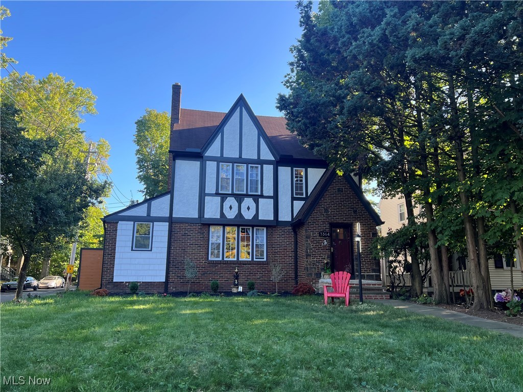 WOW!!! What an amazing tutor style home. This spacious completely remodeled and updated home is stunning. From the moment you walk in, from floor to ceiling, you will notice the level of detail put into this home. Walking into the oversized Livingroom, you will notice the fireplace as the focal point drawing you to the enclosed sun room, making it the perfect escape for reading or that late afternoon nap. To the other side of living room you will find the oversized dinning room, imagine the gatherings of friends and family you can have in a space like this. If you are into entertaining or just want a showpiece in your home, the eat in kitchen will impress: granite countertops tops and stainless steel appliances make this space spectacular! Going to the basement, you will find a beautifully finished space perfect for movie night and finished with a bar for margarita night. On the second floor are three large bedrooms and an updated bathroom; again you will notice the attention to detail in every nook and cranny. The finished third floor can be a master suite as it offers a full bathroom and walk-in closet. Houses with this level of a remodel do not come for sale very often. Do not miss out on a true gem.