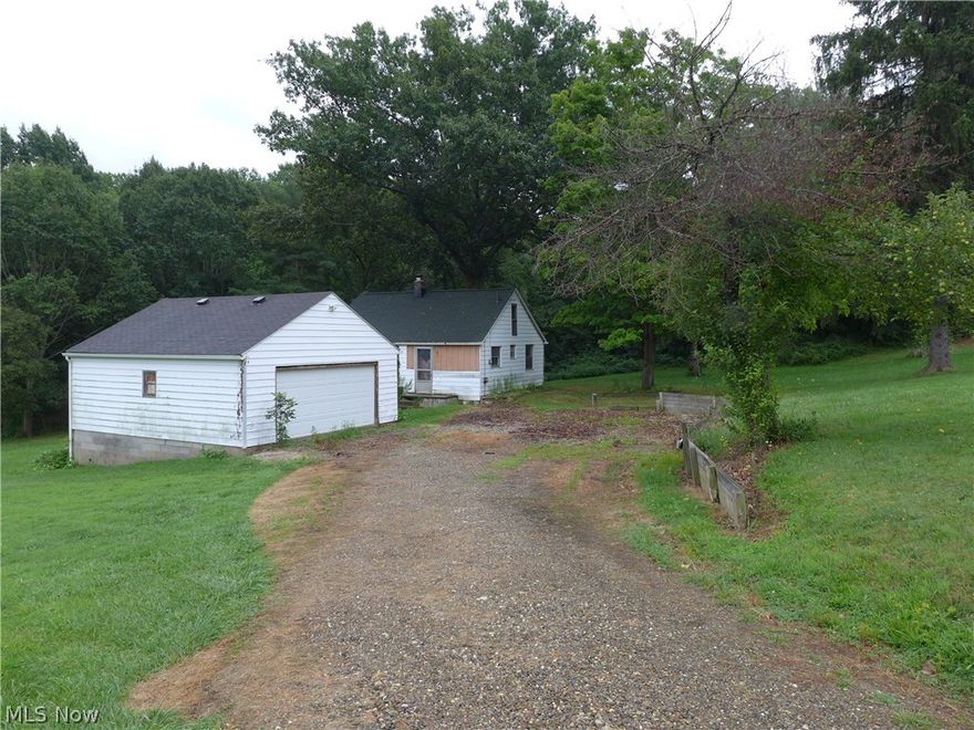 Toolbox time! If you're looking for a rehab project in a sweet Copley location, this is it. Seller says this Cape Cod's got a 10-year old roof, new gutters and a newer septic system, so there's a head-start for you!