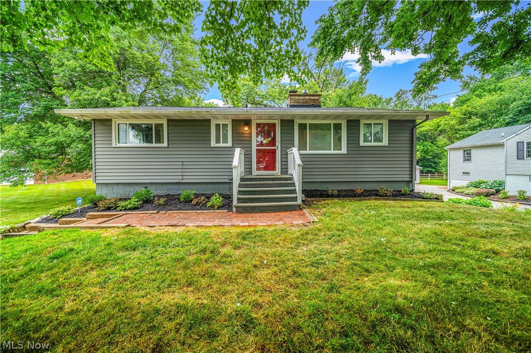 WELOME HOME! This beautiful updated 3 bedroom, 2 bathroom ranch has so much to offer it's new homeowners. As you walk in the front door you'll notice the generous size kitchen that leads into the open concept dining room with a sliding glass door that opens onto a large deck, perfect for entertaining. The cozy living room features a gas fireplace for comfort. The bathroom has been updated with a double vanity sink and fresh paint. The walk-out basement offers a spacious living/movie theatre area, ample storage space, and a laundry area. There's an oversized two car garage with an automatic opener, and a shed for storing all of your tools and toys. This must-have home is loaded with updates and modern conveniences allowing you to move right in. Don't miss out on this incredible opportunity!