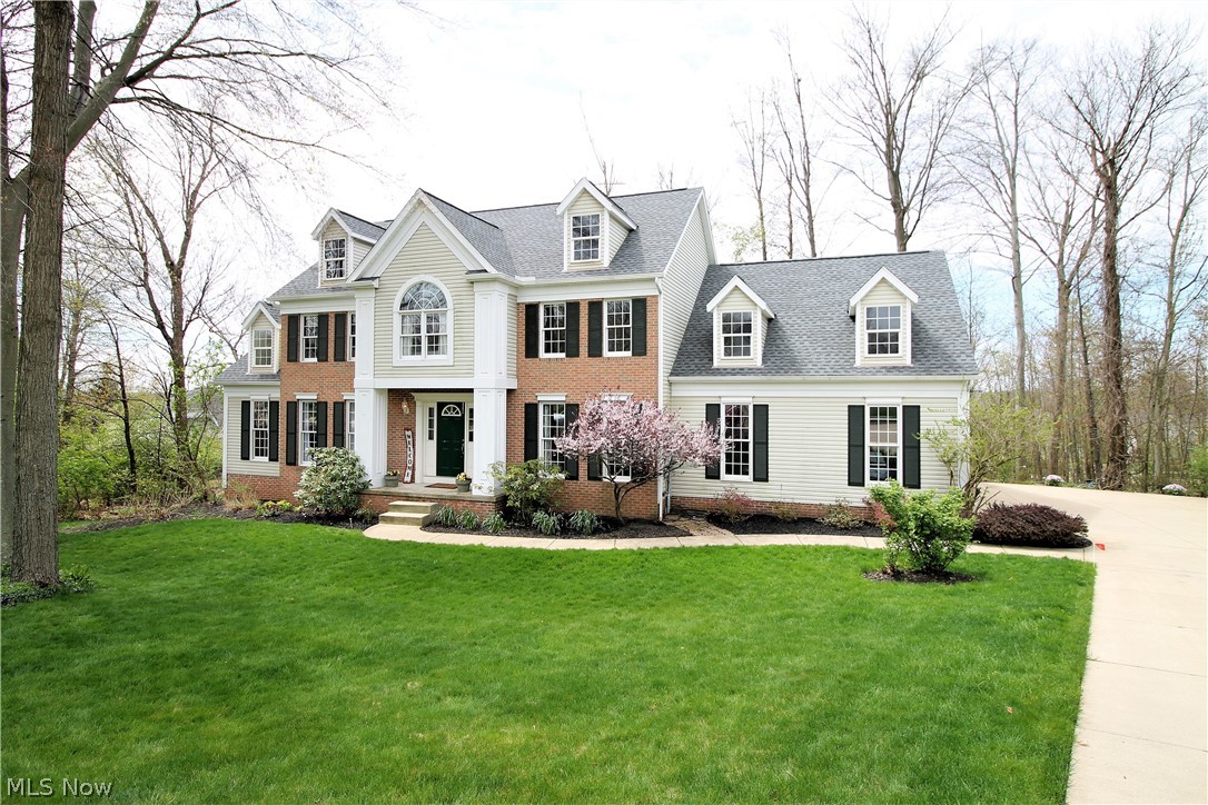 Don't miss this stunning, charming colonial home offering four bedrooms, two and half bath. As you enter through the front door you are greeted by a large open floor plan that leads you to the dining room, living room, office, family room and eat in kitchen. Amazing large open cooks delight kitchen has an abundance or cabinets, huge center island with granite throughout, stainless steel appliances, and work area, wood floors. The dishwasher and microwave, garbage disposal are new (2020). Kitchen also includes an eat in area with sliders to let the natural light to shine through providing easy access to the fabulous back deck to sit out & enjoy and has built in shed. The family room is open from the kitchen with plenty of windows, brick fireplace with mantle, this home has so much room for entertaining etc. The half bathroom and laundry room with sink finishes the first floor. As you go upstairs you will find four large bedrooms including a lovely large master suite, double walk in clos