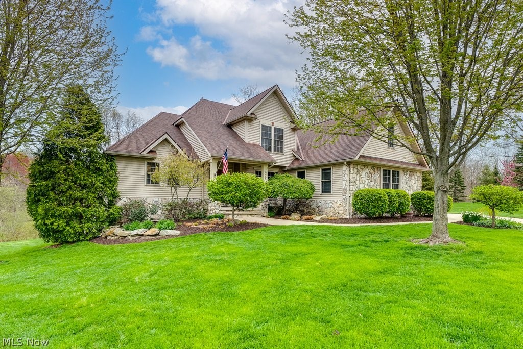Buyers, this is a rare occasion where you can get the BEST of both worlds. You get a home in Rolling Hills subdivision, w/sidewalks, neighborhood activities, a fun culdesac, & you get the privacy of one of the largest lots in the neighborhood located on just under 2 ACRES! You can view your large private backyard oasis from all back windows of the house- you'll feel like you're on a nature preserve anytime you catch a glimpse. The home offers almost 3k sq ft above ground & another fully finished lower WALKOUT level w/tons of windows for natural light in the basement. Freshly painted 1st floor has vaulted ceilings, & you feel the grandeur upon entering the home. The high ceilings give an open layout to the kitchen & double sided fireplace is great for entertaining. You also have the convenience of a dining rm, half bath,1st flr laundry rm, & a large 1st floor master bed/bath(jetted tub/stand up shower/walk in closet). Upstairs is complete w/addl 4 bedrooms & full bathrm. Check out the e