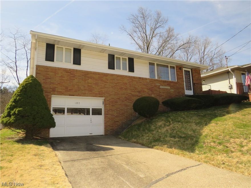 A HOUSE THAT SAYS HOME!  Cozy up to this 3 bedroom ranch home located in Weirton, ready and waiting for its new owner.  The main level has a welcoming and comfortable living room, large eat-in kitchen, 3 bedrooms and full bath for convenient one level living.   There's so many possibilities in the  open and spacious lower level that boasts new flooring and leads to a 1 car garage with work area.  Large, level backyard, central air and more!