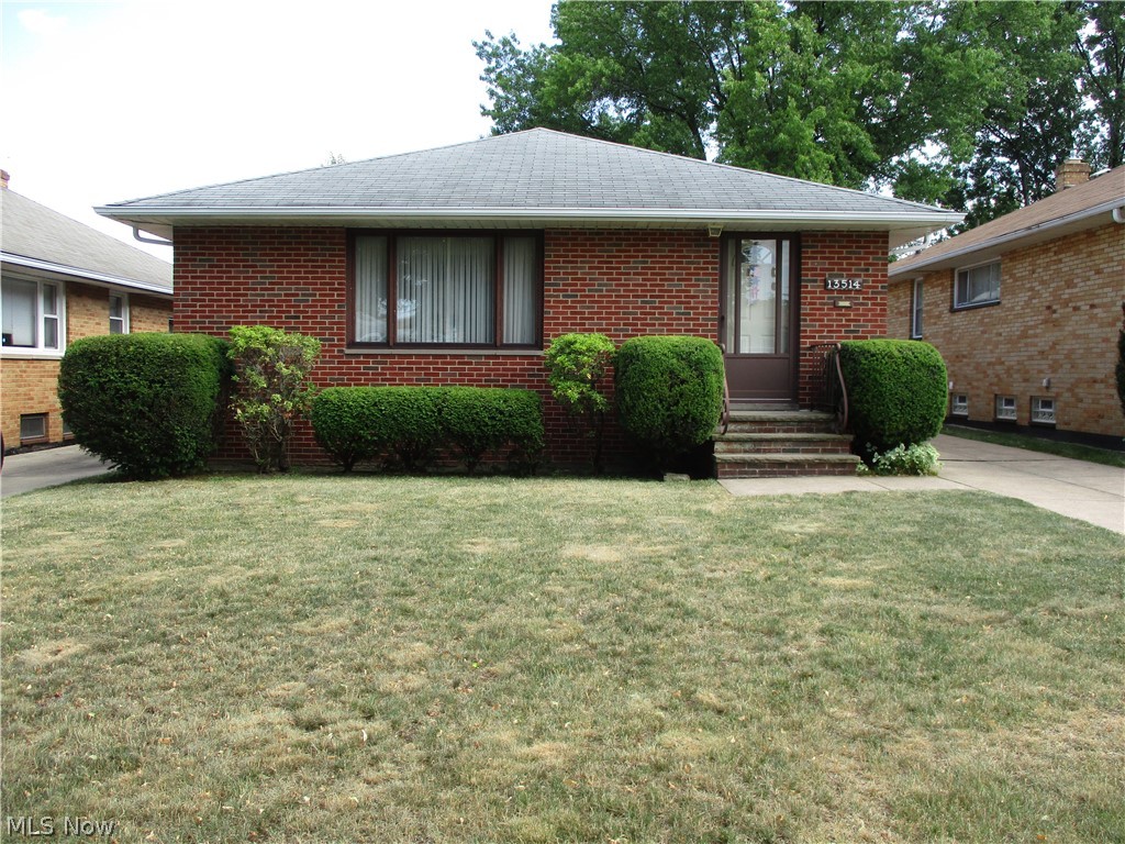 You'll love this mid-century brick ranch on desirable Carpenter Road. This impeccably maintained home has had only one owner, and you'll see the care and attention given to this home from the well-preserved original woodwork to the completely intact vintage tile in the kitchen and bathroom. This classic ranch style features a large picture window in its spacious living room. The adjoining dining room is well-lit and has a large built-in cabinet. Beneath the carpeting in these rooms and hallway, you'll find original hardwood floors. The comfortable eat-in kitchen is clean and bright with wood cabinetry and gleaming white appliances which stay with the house. The three bedrooms each have newer windows, lots of natural light and original hardwood floors. Other upgrades include: furnace/AC (2014); roof (15 years); and vented glass block in the basement along with an additional full bath. Make this first-rate, affordable home yours today. Easy to show and will be POS compliant.