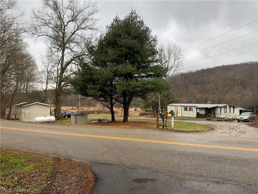 Two 14x70 mobile homes on 4.5 acres. Great investment opportunity - each currently has it's own lease. Each unit has separate land and parcel. Selling as package. Mineral rights do not convey.