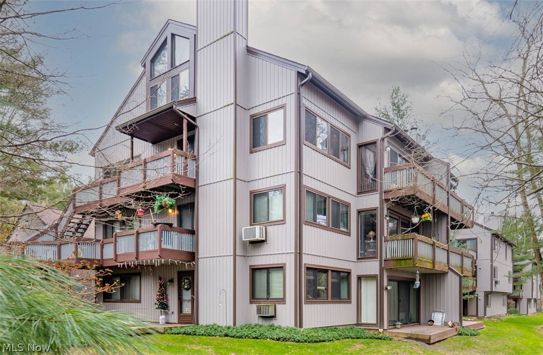 If you think you have seen all that Pine Mill Ridge has to offer, Look Again!!! This condo boasts over 2000 square feet, every inch having been Updated and Meticulously Maintained! Space, Affordability, Features, Updates, and a View you cant pass up... all in the highly desirable Woodridge School District! Enter the condo and become immediately entranced by the vaulted ceilings and numerous skylights throughout the living room and adjoining dining room. Note the details and fine finishes of the fully remodeled Kitchen (2019): Hardwood Cabinets, Ceramic Tile Floor, & Granite Countertops Throughout. Past the kitchen you'll find the recently Updated 1st floor Full Bathroom; continue down that hallway to your two 1st floor bedrooms, both generously sized with Closet Space Galore! The real prize of this condo, (aside from the view), is the Master Suite found on the 2nd floor. Nothing short of Amazing, a Master Suite like this does not appear on the market often. Complete with its own Vaulted Ceilings and a Wall of Windows to take in the Natural Surroundings; in addition to your Full Bath (also Vaulted), AND Walk in Closet!! HOA dues INCLUDE your Water, Sewer, AND Gas, along with Trash Collection, Snow Removal and a beautiful in-ground swimming pool to utilize in the summer months! Maintenance free living awaits! Everything this property offers can only truly be appreciated in person, schedule your private showing today before it's too late!!