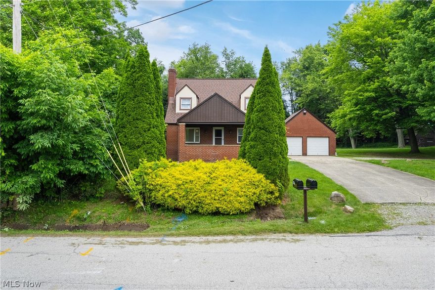 Welcome to 442 Genvea Ave in Tallmadge. This property is tucked away on 1.02 acres offering privacy and much opportunity.! This double parcel lot includes two homes, a charming all brick cape-cod and a lovely ranch making it perfect for a multi-generational family or an investment! The cape cod includes four bedrooms, two full baths and a finished basement. The first level includes large sunroom/breezeway, updated kitchen, formal dining, and spacious living room with wood burning fireplace. There are two bedrooms on the first floor that share the renovated full bath. The upper level offers additional two bedrooms. Lower level includes finished rec room, updated full bath, & utility space. There is a delightful patio that separates the cape cod from the ranch and is ideal for gathering. The ranch home offers all first floor living. There is an ample kitchen, living room, two bedrooms and full bath. There is a separate room for laundry and utility. This set of washer & dryer does convey. Both structures have been well-maintained, all new flooring, fixtures (as needed) and paint throughout. The exterior features include: detached two car garage, oversized shed, patio, front porch, and additional parking. The garage includes a workshop. Updates include new hot water tank, furnace (cape) (2023), vinyl windows, remodeled bathroom (cape), new roof (ranch & shed) (2024), exterior painted (ranch) (2024), two new mailboxes (2024). There is nothing to but move-in! Call or text for your private showing today!