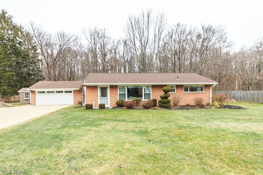 A ranch with a view! This quaint three bedroom home in Chardon has laminate wood floors throughout, and a fully updated kitchen with all stainless steel appliances and a walk in pantry. You won’t be able to look back after stepping foot into the dining room, boasting an electric fireplace and nothing but windows to take in the spectacular view of the park-like backyard. Large master bedroom accompanied by two spare rooms with pull down storage, closet organizers, and a glass sliding door to the large Nature Stone back patio where you can enjoy your privacy and relax to the sounds of the cascading coy pond while looking into the woods. Attached two car garage and large shed. Newer furnace, AC, and roof. The ceramic tile laundry room complete with half bath is an added bonus. Don't miss this wonderful opportunity. First floor living at its finest!