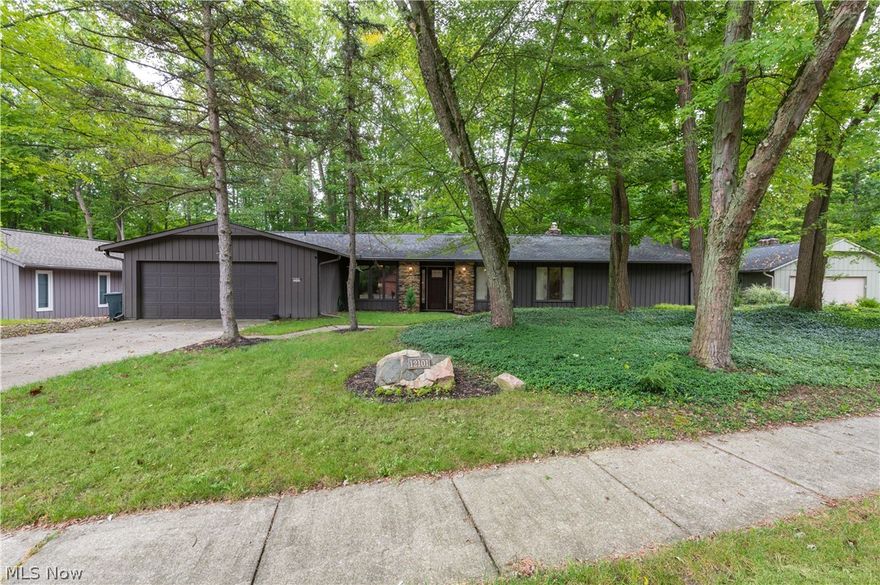 Stunning, recently updated 3-bed, 3 full bath Ledgewood ranch house is nestled into a magnificent scenic wooded lot overlooking a beautiful forested ravine on a cul-de-sac street. Neighborhood is situated in the Metroparks. With nearly 2,300 sq. ft. of well-laid out, single-level living space this is the ideal floor plan with new flooring, freshly painted, updated bathrooms, and large bedrooms. Great balance of modern updates and refined character. Real stone fireplace complements stone exterior entrance. Newer kitchen features granite, stainless-steel appliances, open to the living room and formal dining area, which opens up to the expansive backyard deck. The spacious family room includes a natural gas stone fireplace, a wall of windows, and multiple sliding doors that open to the expansive deck overlooking the beautiful, lush, and private forested backyard. Spare bedroom is a true retreat with access to a private courtyard patio and a built-in in-law suite is great for entertaining, privacy, and/or use as a recreation or bonus room! Easily convert in-law suite to a large walk in closet. Breathtaking views throughout the house to the gorgeous wooded backyard, Ledgewood community amenities include Olympic-sized pool, children's pool, clubhouse, basketball & tennis courts, rolling hills throughout, playground, and much more! Easy access to turnpike, 71, shopping, and community rec. Immediate occupancy. Home Warranty Included.