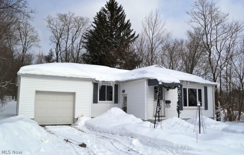 Don't miss this one! Walking distance to Chardon Square! 2 Bedroom with possible 3rd Bedroom or Office, 1 Bath home. Cozy up in the large Living Room which opens to a spacious Kitchen with Cherry flooring. Generous bedrooms. Walk-out basement with plenty of storage. 1 car garage. Situated on .63 acres. Newer roof, vinyl siding, windows, hot water tank and electrical panel. One year Home Warranty provided. Perfect place to call home! Call TODAY to view!