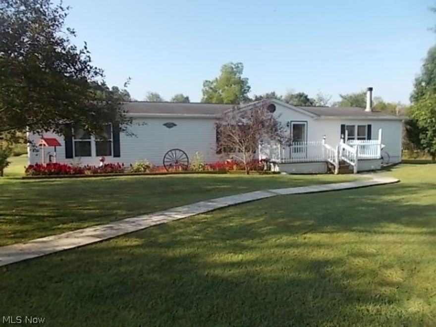 Beautifully landscaped and Immaculate, this 3 Bedroom 2 Bath home is located on 5 acres in East Guernsey School District. Over 1800 square feet of living space. All on one floor living, you will enjoy the space this home has to offer. Entry foyer leads to family and living room w/ fireplace, Spacious Eat-in kitchen with lots of cabinetery and formal dining room. Large covered back porch for entertaining with views of country for miles. A must see home!