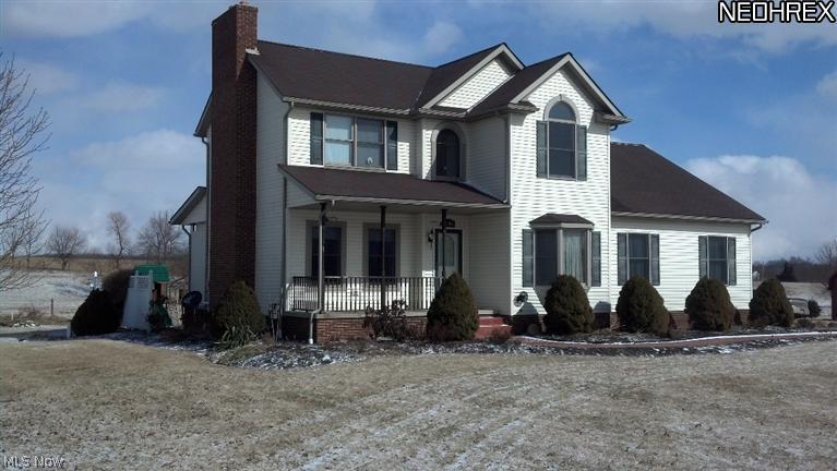 This lovely 4 bedroom 2 and a 1/2 bath home is a well built home. The master bedroom is on the first floor w/ master bath with a shower and a soaking tub two walk in closets. The fireplace in the Family room has a gas starter for the wood. The kitchen cabinets are hickory.42 wall cabinets. the ceiling on the first floor are 10'the home has a lot of extras come and see.