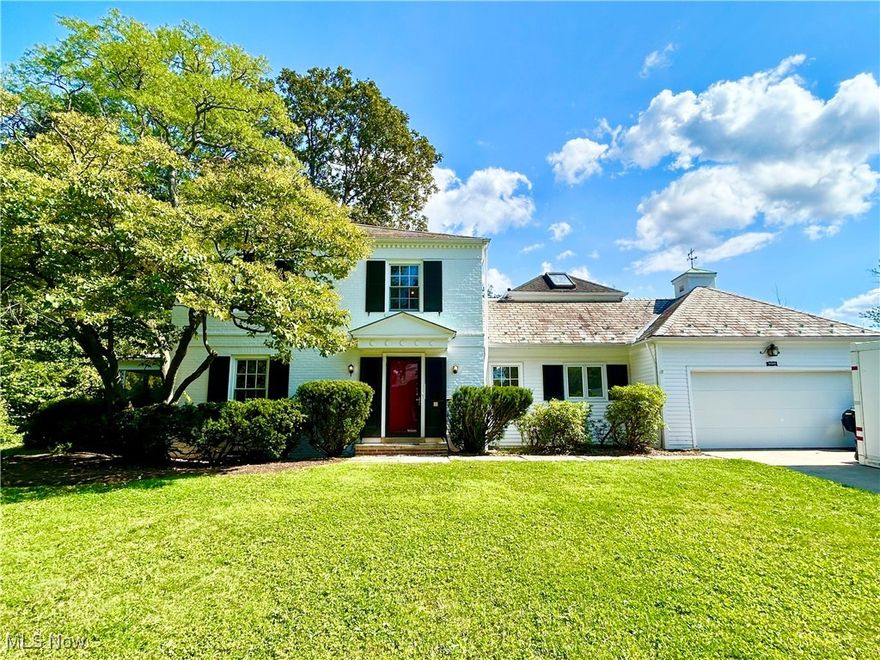 Forest Hill Heritage Home and Gardens!  This mid-century colonial has so much potential with gorgeous wood floors, built-ins and solid wood doors. First floor offers a welcoming foyer and a huge living/dining room combo with tons of natural light, a gas fireplace and built-in bookshelves.  The cozy kitchen has granite countertops, bamboo floors, a cute breakfast nook and a window over the sink that overlooks the gorgeous gardens. The screened-in porch is perfect for additional entertaining space and allows for additional enjoyment of this private, corner lot.  Second floor has 4 bedrooms including an ensuite and a full hall bath.  The waterproofed basement adds additional living space with an Everstone floor, laundry space and storage cabinets. Out back is a stone path leading to an enchanting series of gardens including a pollinator garden that is ready to be restored to its former award-winning glory  A 2-car garage completes this lovely home. Updates include:Furnace 2023, HWT 2020 and more!  Located in a desirable neighborhood and less than a 10 minute drive to University Circle, museums and Case Western Reserve University.  If you love classic, original charm, this home is for you! Check out the 3-D tour and call for your showing today!