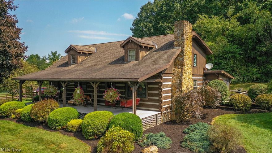 Look no further for a move in ready log home nested on a secluded, 15.35- acre lot. The beautiful 3 BE/2.5 BA log home is located minutes from Coshocton and West Lafayette on County Road 16. Enjoy the tranquil setting of this fabulous home from the front porch or deck. The open concept kitchen has a center Island, granite counter tops, stainless appliances and tile flooring. Beautiful newer cabinets with custom pull out shelving and cooper sinks. Conveniently located 1st floor suite, attached bath, and 2nd bedroom/office room. Cozy up on a cold winter evening in front of the floor-to-ceiling wood fireplace or enjoy the beauty of the outdoors from the sunporch or screened porch. The upper level includes a spacious loft area and a master suite with full bath. The full walk out basement offers numerous options for additional living space or entertainment. The property has a spacious 2-car detached garage and a 26X30 barn with two horse stalls and fenced in pasture areas. This is the dream