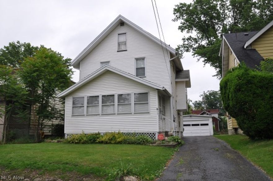 Super clean, well maintained 3-4 bedroom home w/spacious rooms, enclosed front porch, half bath on 1st floor, full walk-up attic, hardwood floors under carpet, double garage, fenced back yard. All appliances stay.