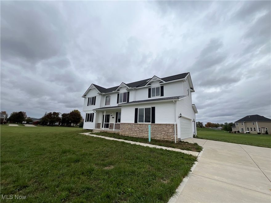 Welcome to this New Construction Home featuring all modern ammenites located in Grey Hawk! Comeinto approximately 2600 sq ft of living space featuring 2-story foyer, convenient mud room with built-in closet. The chef in you will love the modern open kitchen, featuring quartz countertops, range, refrigerator and there is even a mini wine cellar. The home features high ceilings and open floor plan. The second floor features a laundry room, 3 bedrooms plus a bonus loft on the second floor, the oversized master bathroom features tiled shower and vaulted ceilings. There is a full basement for plenty of storage. The exterior features stone with vinyl siding and "gingerbread ornamental" and Pella windows for a beautiful modern, clean look. Call Mike for showings and any questions.