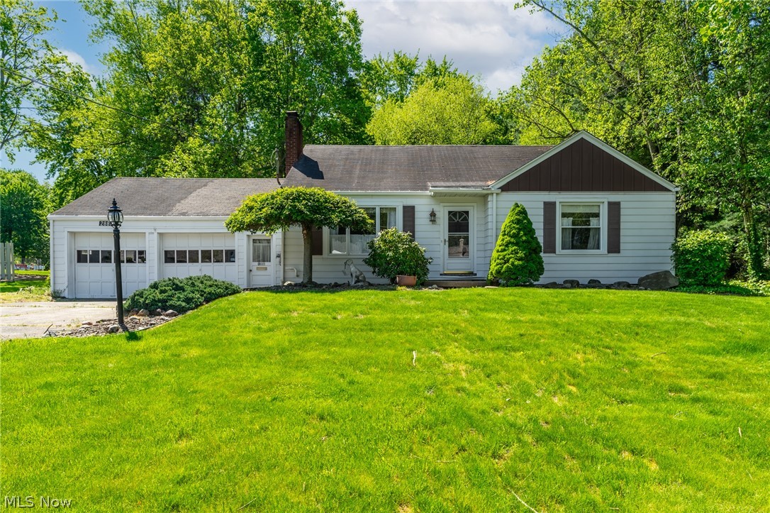 Spacious Cape Cod in Poland Schools on a nearly 3/4 acre wooded lot. The main level of this home plays host to a large kitchen open to a formal dining area, a living room with gas burning fireplace, an expansive family room with wood burning fireplace, two bedrooms and a full bathroom. A third bedroom, a half bath and a bonus room comprise the second level. A full basement provides ample storage, as well as, a second full bathroom. Exterior features include a two car attached garage, 23 x 10 enclosed rear porch and a storage shed. The first floor bedrooms, living room, dining room and hallway feature hardwood floors under the carpet. Several of the windows are newer and the furnace is approximately 8 years old. Call today!!