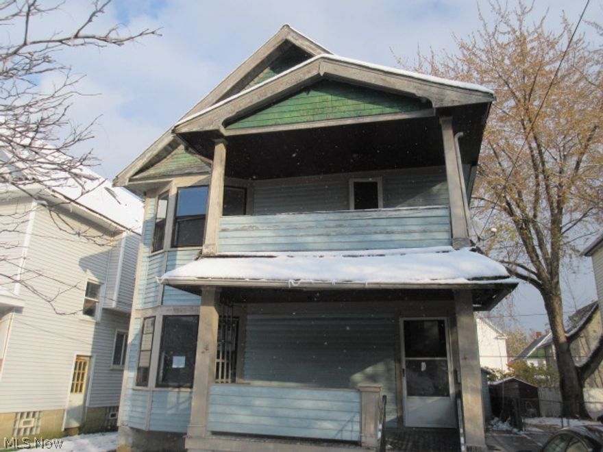 Large duplex, 4 bedrooms, 2 bath home. Hardwood floors and some natural woodwork. It has an open porch. Full, unfinished basement. Fenced yard and a 1 car detached garage. This property is eligible under the Freddie Mac First Look Initiative through Dec. 23, 2014.