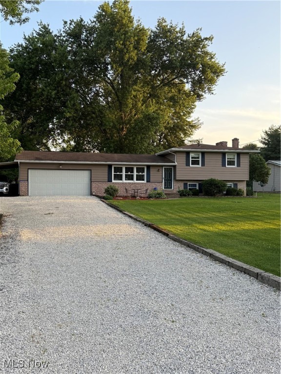Welcome home to your new house. The house is on an acre lot with an invisible fence, so if you have a pet they have plenty of room to enjoy. The house has a spacious deck on the backside of the house. This house has a paved basketball court in the backyard as well. There is new carpet throughout. The seller put in vinyl flooring for the living room. The seller put down new mulch and had it power washed. The house has a good-sized attached garage as well. Don't miss out on your chance to call this place home.