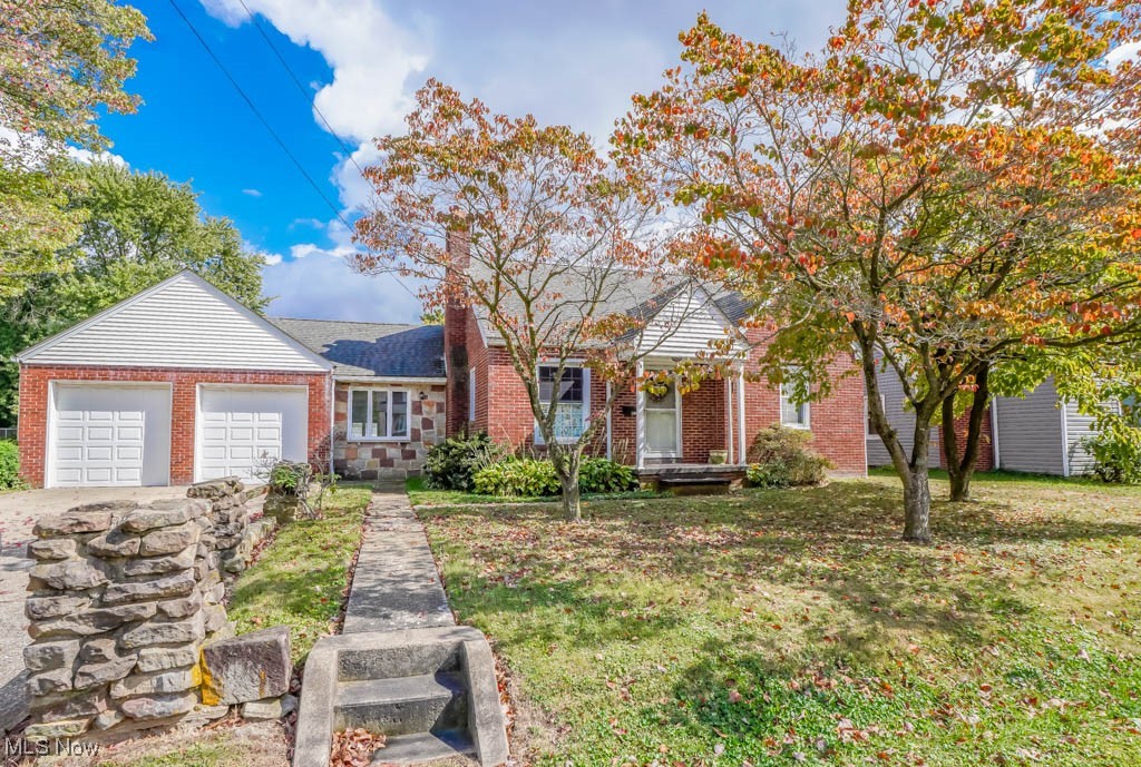 You’ll love the amount of space in this 3 bedroom Perry Township bungalow! The living room features a faux beamed ceiling and gas fireplace, while the vaulted family room adds a decorative stone fireplace for extra character. An archway connects the dining room to the kitchen, complete with a refrigerator, stove, and pantry. Two bedrooms and an updated full bath with a walk in shower and solid surface vanity complete the main level. Upstairs, you’ll find a spacious third bedroom with cedar closet storage.
The finished lower level is a great spot to gather, offering a rec room, kitchenette, and another full bath. Outside, a large backyard with a patio is perfect for cookouts, and the storage barn provides room for all your extras. Off street parking in the driveway leads to the attached two car garage with glazed block walls. Conveniently located near shopping, dining, and schools, this Perry home is ready for you to see today!