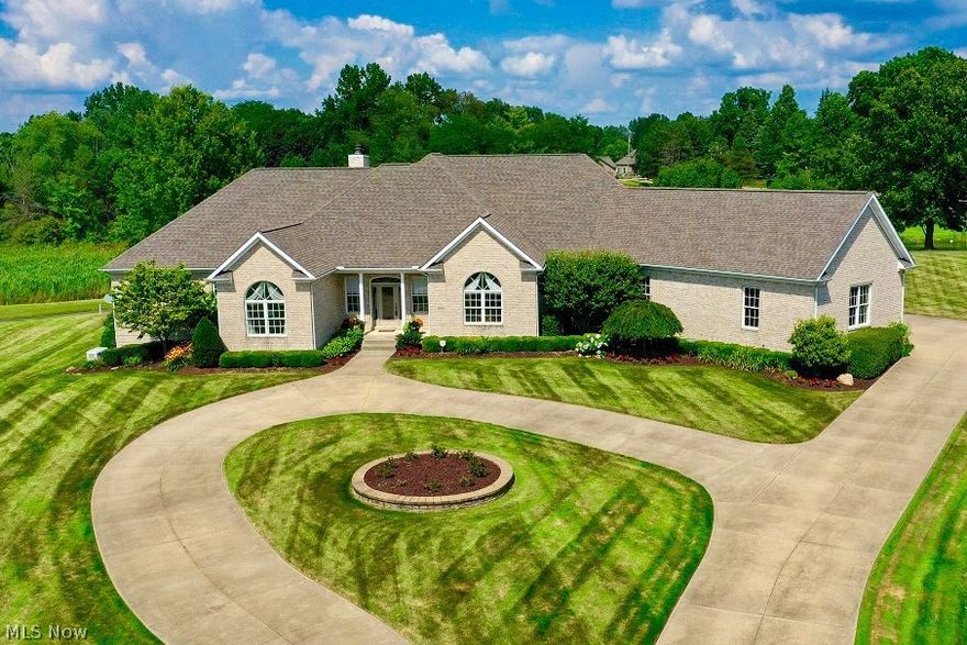 Extensively updated brick ranch on .82 acre cul-de-sac lot on the golf course in the Estates of Glenmoor. Offering 4720+ sqft of one-floor living with 5 bedrooms, 5 full & 2 half baths. Open concept kitchen/great room includes wood-burning fireplace with gas starter.  Beautiful sunroom with built-in bar overlooks outdoor living area with panoramic views of the 11th hole & 12th tee box. The 44' x 41' patio features gas-starter fire pit, hot tub and outdoor grilling area. Spacious master suite has a sitting area, new spa-like master bath and incredible 17' x 12' walk-in closet.  Remaining 4 bedrooms each feature their own updated ensuite bathroom.  Conveniently located first floor laundry room.  The finished basement provides a theater room, kitchen, bar, and putting green as well as state-of-the-art woodworking shop and plentiful storage.  Oversized 4-car garage plus space for golf cart and storage.  Hurry to see this exceptional home!