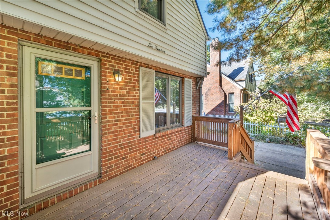 ~ Opportunity knocks! This well cared for brick beauty with hardwood floors throughout is ready for your finishing touches!! All brick home with oversized rebuilt garage with workshop off the back with private entry. The front room has space for anything you may need! Living Room~Dining Room~Office~Playroom~or anything in between! First floor bedroom and full bath off the hall lead to the eat in kitchen with lots of cabinet space and appliances included. The 2 additional bedrooms are located upstairs with loads of closet space. The rec room downstairs is AMAZING with real knotty pine walls and original built in bar and the perfect spot for your next throwback party! Separate area for craft/den/work out area and bright laundry area with W/D included. Lush back yard is private and petite. FANTASTIC location.....just a few blocks from Lake Erie, parks, recreation, shopping, dining, freeway access and easy commute!!  Newer*** Furnace/AC 2016*Anderson Replacement Windows 2013*Glass Block Windows*Garage Rebuilt 1996*Concrete Drive*Steel Entry Doors* Roof 2009*& so much more! Schedule your showing today!