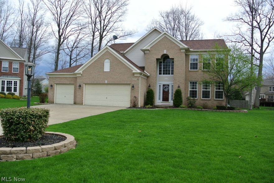 Beautifully Appointed brick front colonial home sits on a private cul-de-sac lot in the desirable development of Waterford Crossing.  Immaculate & Inviting throughout - Shows Like A Model!  Move-in Condition!  Over $45,000 in upgrades & improvements including a 2-yr. old roof to protect you for the next 25+years!!  ALL appliances included!!  A convenient & functional laundry is on the 2nd level.  The finished lower level has an additional 1,200 sq.ft. of living space - full bath, area for entertaining, office, bonus area for exercise/crafts/play and TONS of storage!!  The 3 car garage offers an attic for extra storage w/pull-down stairs. Entertain in the partially wooded backyard on the fabulous large patio with tranquil fountain.  Waterford Crossing development includes: Kinsner Elementary, Clubhouse, Swimming Pool, Volleyball Court, Tennis Courts & Playground!  A MUST SEE!!