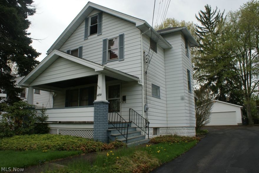 2-1/2 story 3 bedroom home with hardwood floors.  Formal dining room with doors to trek deck.  Eat in kitchen with breakfast nook.  All appliances.  2 car garage with electric, shared drive and extra parking area.  Basement water proofed with sump pump.