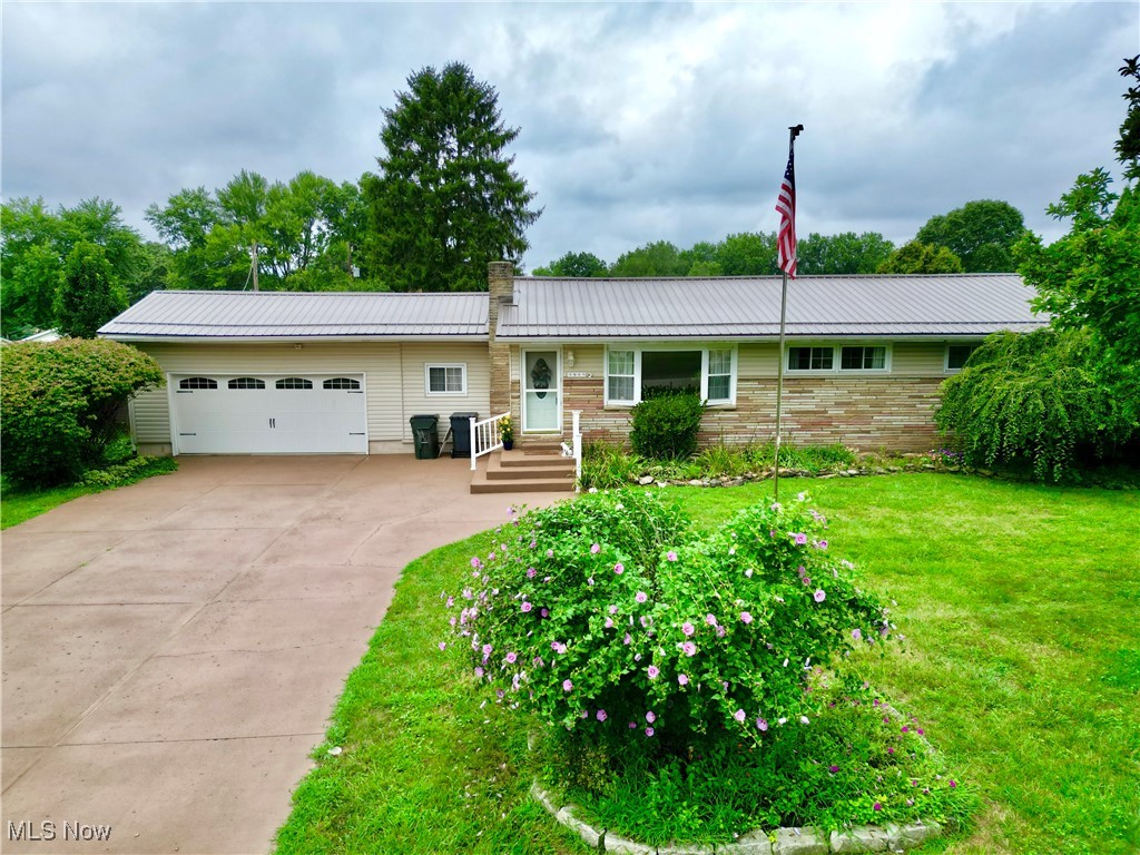 Stunning 5BR, 3BA ranch blends comfort, nature, and community living. Enjoy a private backyard oasis with pool, hot tub, koi pond, and covered patio perfect for year-round entertaining. Inside features a smart layout with first-floor laundry, cozy fireplace, and open living space. Finished lower level offers a retro-style rec room, 2nd fireplace, and kitchenette—ideal for hosting or multi-gen living. Optional HOA includes community events and access to Melody Lake for fishing and outdoor fun. A rare mix of space, privacy, and neighborhood charm!