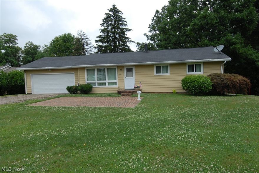 Nicely maintained 3 bedroom ranch with finished walkout basement, and 2 car attached garage.  Hardwood floors in living, dining, and bedrooms.  Ceramic tile kitchen, bath, and laundry.  Newer windows, doors, garage doors, and roof.