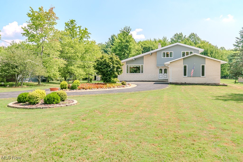 Great Family House with tons of storage, pristine and immaculate Spacious 3 bedroom Colonial with Hardwood flooring throughout. Relax in open floor plan, vaulted ceiling, Large Living Room /Dining room or in the two step-down level family room area with fireplace which exits to the backyard deck or the front entrance. Laundry is located on the two step down level. The Eat in Kitchen comes complete with appliances. Upper level features three bedrooms with an abundance of closet space. The basement lower level features, rec room, workshop and utility area. This solid home is nestled on 3.8 acres including an out building.