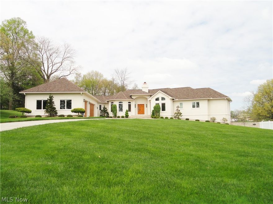 Simple elegance defines this Silver Lake Estates Lakefront Ranch!  Custom built in 2010 using excellence and perfection as the standard for every detail.  Situated carefully on 1.62 acres to offer unobstructed lake views from almost every room. Neutral décor throughout complimented by hickory trim, cabinets, custom windows & doors. Schrock hickory custom cabinets in the kitchen with black granite, all high end appliances including a jennair stove top & porcelain tile . The brightly sun lit breakfast nook and great room both have a wall of windows offering a serene view of the grounds and lake.  The main floor has 3 bedrooms and 3 full baths.  Master suite offers his and her closets plus his and her bathrooms. 10 ft ceilings throughout plus trayed or vaulted ceilings in the master, dining room and office. The expansive lower level has a family room, 4th bedroom or office with fireplace and a fourth full bath. Plus there's an additional 1000 sq ft suitable to finish or provide room for s