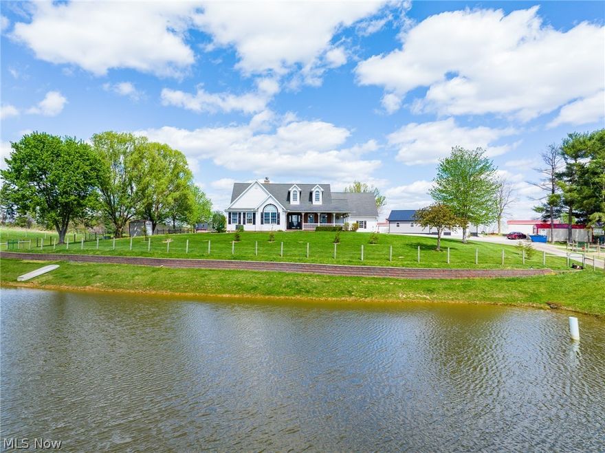 This beautiful property, set on 8 acres, offers the ideal combination of usable land and country living. With a mix of open ground, approximately 6 acres of fenced pasture, and a centrally located pond, the property is well-suited for hobby farming, livestock, or simply enjoying a peaceful rural lifestyle.
The home features 3 bedrooms and 2 full bathrooms, with a spacious main living area highlighted by vaulted ceilings that connect the kitchen and living room. A separate dining room and dedicated laundry room add to the home’s functional layout. The primary bedroom includes a private full bath complete with a jacuzzi tub and separate shower. A partially finished basement provides additional space for recreation, storage, or future living area. Utilities include geothermal heating and cooling, a natural gas tankless hot water heater, private well, and septic. Outdoor living is just as inviting, with both front and rear covered porches along with a stamped concrete patio.
The outbuildings add excellent versatility to the property. A 30’ x 60’ detached shop/barn, built in 2023, is fully insulated and features two overhead garage doors along with a man door. The barn portion includes four portable stalls, while the shop area remains open for a variety of uses. A 20’ x 24’ three-sided machinery shed provides additional storage for equipment, hay, or other needs.
Whether you’re looking for a small farm setup, room for animals, or a well-rounded rural property with quality improvements, this one offers the space and flexibility to fit a wide range of uses.