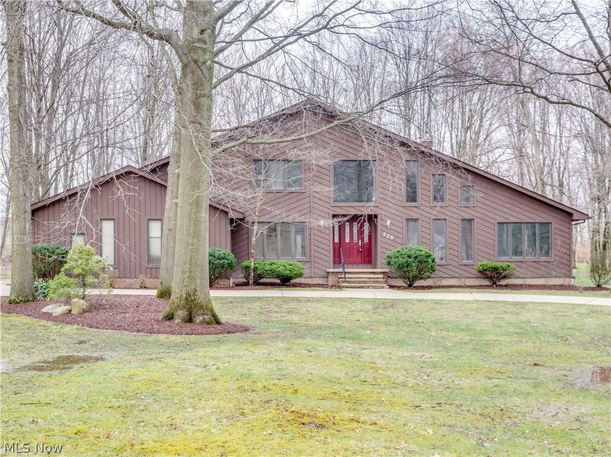 Spectacular Contemporary located in the desirable "Springtree" subdivision of beautiful custom built homes on large lots with access to the community swimming pool and tennis courts! Appealing style with bright and open floor plan, over 3000 sq ft of living and vaulted ceilings throughout! Front leaded glass door leads to the 14 x 11 two story foyer entry with open staircase and floor to ceiling windows. Formal living and dining room with hardwood floors. Eat in kitchen with double ovens, island and desk all open to the 30 x 20 family room with vaulted ceiling, skylights,bay window,wet bar and skylights. Spacious first floor master bedroom with updated bathroom includes a jetted tub and separate shower. First floor laundry and 1/2 bath complete the first floor. The second floor has a loft plus three more very spacious bedrooms. Roof replaced in 2017 and the HVAC is about 8 years old. Situated on over a 1/2 acre lot with an impressive  concrete circle driveway and 4 car garage! Overlook