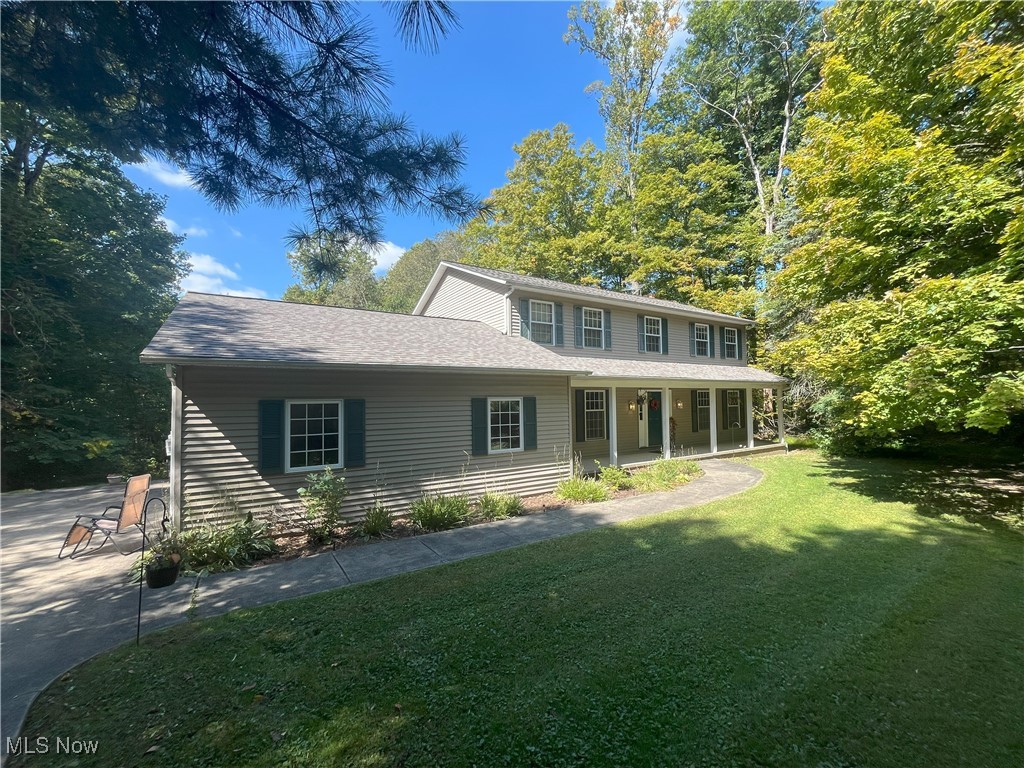 Tucked away on a private 1.94 acre lot on a quiet cul-de-sac road, this Colonial offers over 2500 sq/ft of living and an unfinished basement (partially studded) that is over 1300 sq/ft. As you enter the Foyer there is a spacious living room and extra living area for all your family's needs. The large eat-in kitchen has a bay window and open floor plan to the Family Room with a wood-burning fireplace. There is also a half bath and laundry room adjacent from the entrance to the garage. Upstairs boasts a master bedroom with an on suite full bath and walk-in closet plus 3 other bedrooms and a full bath. Enjoy nights on the deck or sitting around the fire pit in the large, private backyard. There is a seamless and 100% private connection to nature with this fantastic home. Septic was serviced in 2/2024 and a new roof in 12/2023.