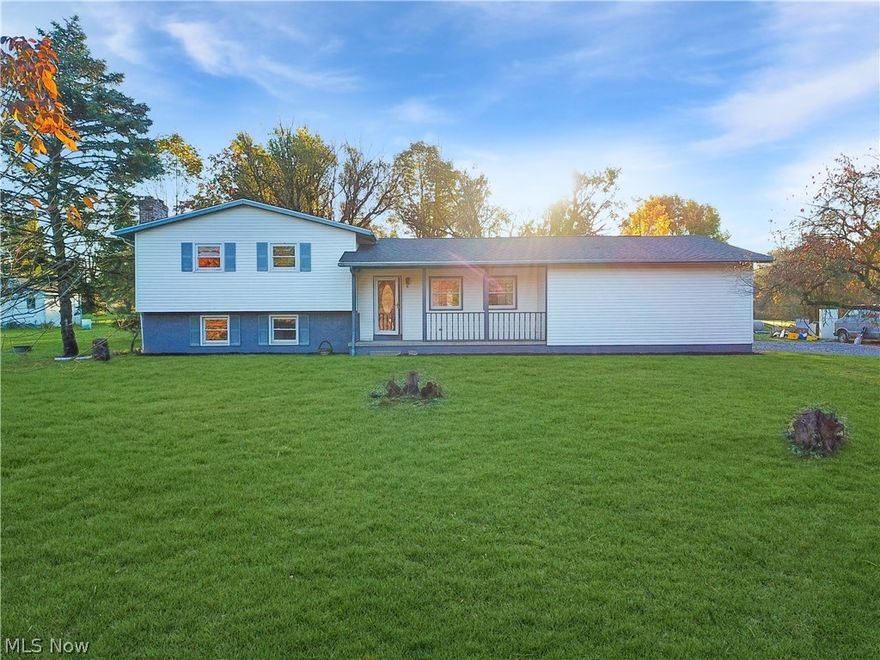 Welcome to this newly remodeled 3 bed 2 full bath home on just over 5 acres with a fully stocked pond. As you enter from the covered front porch you are greeted with an extra large living room with vaulted ceilings, a fireplace, and sliding glass doors that lead to the newly constructed deck overlooking the backyard. Off the living room is the kitchen with freshly painted cabinets with new hardware, granite countertops, and a new sink. There is a sitting area for bar stools here and a nice formal dining space that also has sliding glass doors that overlook the backyard. Upstairs you will find 3 bedrooms that all have new carpet & paint and the bathroom that has been completely remodeled and updated. Down to the lower level, there is a family room with a fireplace that would be a perfect spot for a home office. Another full recently remodeled bath and an extra spacious laundry room. The basement level of this home has extra storage space. Other updates include new AC & furnace, basement
