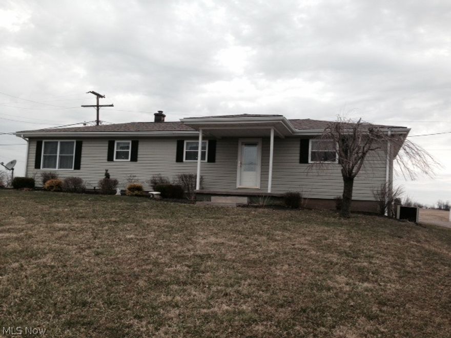 Here is what you have been looking for!! A country home on over 2 acres with a horse barn, fence and oversized garage that will fit up to 5 cars. House is totally remodeled and ready to move into. WON"T LAST!!