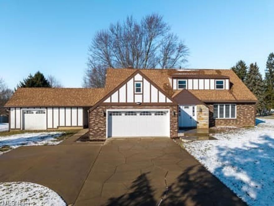 Experience refined living in the prestigious lake Harmony development with this stunning Tudor-style residence, perfectly positioned on a prime corner lot. Blending classic architectural charm with sophisticated modern updates, this four-bedroom, three-bath home offers both elegance and functionality. From the moment you enter, you’ll appreciate the expansive room sizes, thoughtfully designed layout, and seamless flow ideal for both everyday living and elevated entertaining. At the heart of the home is a beautifully appointed gourmet kitchen-a true showpiece featuring quality finishes, abundant cabinetry, and generous prep space designed for the culinary enthusiast and host a like. The oversized two-car garage, complemented by an additional 1.5-car garage, provides exceptional storage and versatility-perfect for vehicles, recreational equipment, or workshop space. Lake Harmony residents enjoy exclusive lake access, private beach privileges, swimming, fishing, and a lifestyle that feels like a year-round retreat. This is more than a home- its an opportunity to live beautifully in one of the area’s most sought-after communities.