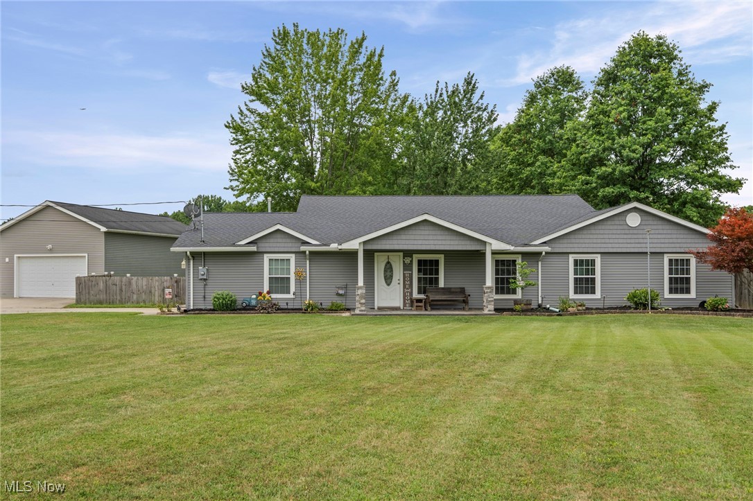 Welcome to your own slice of paradise in Columbia Station! This move-in ready 4-bedroom, 2.5-bath ranch sits on 4.99 beautiful acres—a perfect blend of comfort, space, and adventure for the whole family, including your four-legged friends!
The majority of the home was renovated in 2017 (including but certainly not limited to, the roof, siding and windows), and the furnace and A/C were replaced in 2023, offering modern updates and peace of mind. Inside, you'll love the open, flowing layout with a bright kitchen featuring stainless steel appliances, a kitchen bar for casual bites, and a separate dining room for family dinners and holiday gatherings.
There’s plenty of room to relax with a spacious living room and a cozy family room featuring a wood-burning stove—perfect for chilly Ohio nights. The oversized master bedroom is a true retreat with a huge walk-in closet and spa-like bath including a jetted tub, a separate shower, and heated floors. A laundry room with utility sink adds daily convenience.
The covered back patio with 3 permanent walls (and a removable plexiglass outer wall) is a great year-round bonus space for hobbies, playtime, or morning coffee. Outside, enjoy a covered front porch and large back patio—ideal for relaxing or entertaining. The fully fenced backyard is great for pets and kids, while the remaining acreage invites exploring, bonfires, gardening, or even a treehouse.
For the hobbyist or entrepreneur, there are two large outbuildings—one 24'x40', the other 24'x36'—plus a 10'x10' shed for extra storage.
Located in peaceful, family-friendly Columbia Station, this home offers country living with space to grow, play, and breathe. Whether it’s roasting marshmallows under the stars, watching your dog race across the yard, or curling up by the fire—this property has something for everyone.
