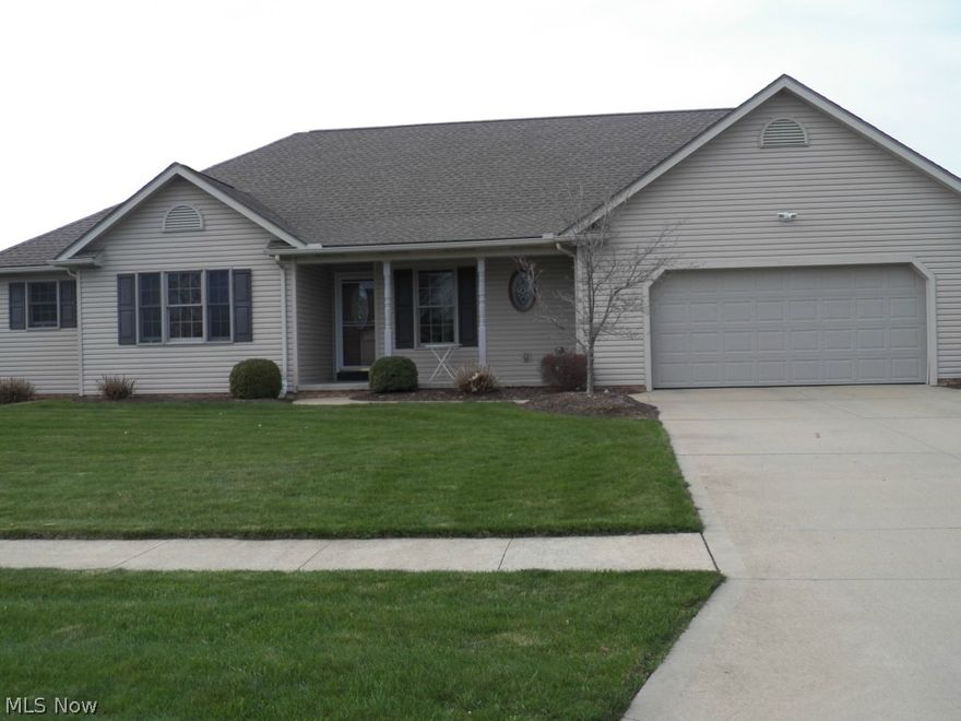 Built in 2004 This Gorgeous Ranch has been recently updated with Quality Hardwood Flooring.  The Great Room has a magnificent Gas Fireplace and Vaulted Ceiling.  If it is Kitchen Counter Space you need this fully applianced Kitchen was built for you!  A Unique Jack and Jill Bath is nestled between bedrooms 2 and 3.  There is a spacious first floor Laundry Room and an open concept oak staircase leads the way to the sprawling basement just waiting for finishing ideas.  The Pool table also stays.  There is a 15 X 15 Concrete Patio enclosed with white Privacy Vinyl Fencing and a charming covered front porch that welcomes you Home!