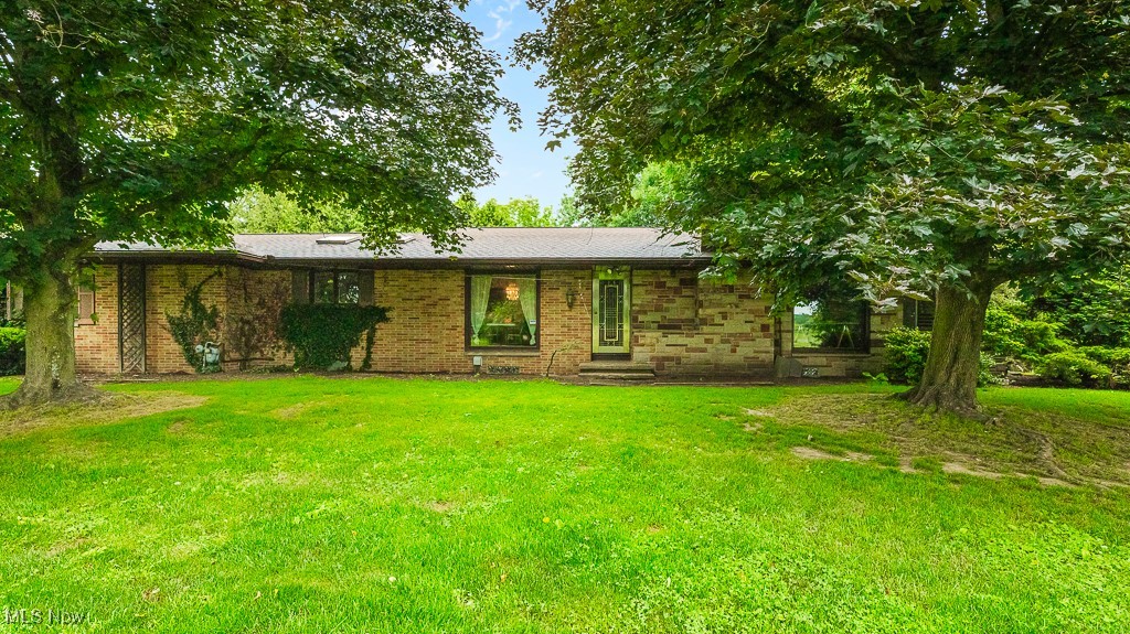 Welcome to 3999 Stimson Road in Norton. This all-brick ranch is set on 10.5 acres within the Copley-Fairlawn School District and features 3 bedrooms, 2.5 baths, and an attached 2-car garage. The property includes a large fenced-in yard, a pond, a creek, and a privately owned gas well. A plumbed and heated outbuilding—currently configured as a dog kennel with an office—adds valuable flexibility for a variety of uses. This well-maintained property offers space, privacy, and the potential to fit a wide range of needs.