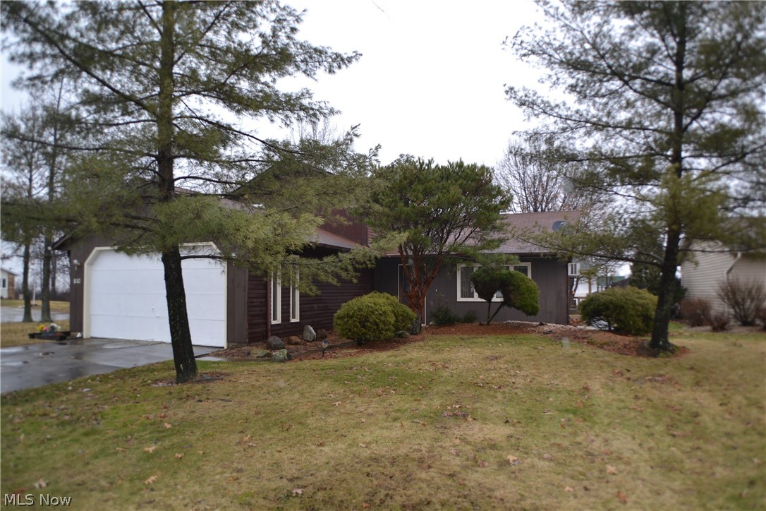 Spacious split level on private lot. Features include four spacious bedrooms - master with full bath on first floor- large living room, eat-in kitchen with double ceramic sink with disposal, refrigerator, Kenmore dishwasher, Tappan range with hood fan, planning desk, loads of cupboards, sliding door to rear patio, first floor laundry room with Kenmore washer and dryer, large two car attached garage, door operator, ceiling fans, two skylights, HMS home warrantey and much more. Needs a little TLC, being sold as is.
