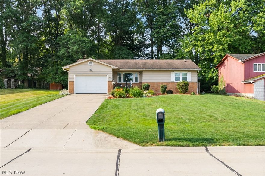 Welcome to this spacious ranch style home located in desirable Fairlawn locale.  This welcoming abode offers three nicely sized bedrooms and two baths.  There is a large living room which opens to the eat-in kitchen.  The kitchen has been recently updated with cherry colored cabinetry, stainless steel appliances, and granite countertops.  All three bedrooms have natural hardwood flooring.  The dining area has sliders that exit to the fully fenced backyard which is perfect for pets.  The backyard makes you feel like you are in a park.  The basement is finished and offers a ton of extra living space.  All of this plus a one car attached garage.  This home has been lovingly maintained and is awaiting a new owner.  Call to schedule a showing today to make this your new address.