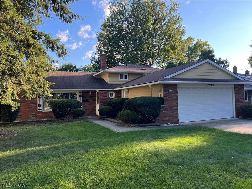 This lovely, well maintained split level is in the very desirable Big Creek Estates Sub-Division within just minutes to the Big Creek Parkway.  This home offers a large formal Living Room and Dining room, both offer an abundance of space, perfect for gatherings and entertaining.  Eat-In-Kitchen offers ample cabinets and counter space. The lower-level Family room has a walkout to the Tranquil backyard, full wall wood burning fireplace, a great space to enjoy on those chilly upcoming fall evenings. The lower-level utility room is located off of the family room, there is a half bath, small kitchen and of course the laundry room, it leads to the two-car attached garage.  Upstairs you will find three generous bedrooms all with adequate closet space for all of your storage needs.  The full bath has been updated with ceramic tile, new vanity/top and tub surround.  This home has had many updates over the years.  The large backyard is fully fenced in with a patio, still plenty of time to enjoy