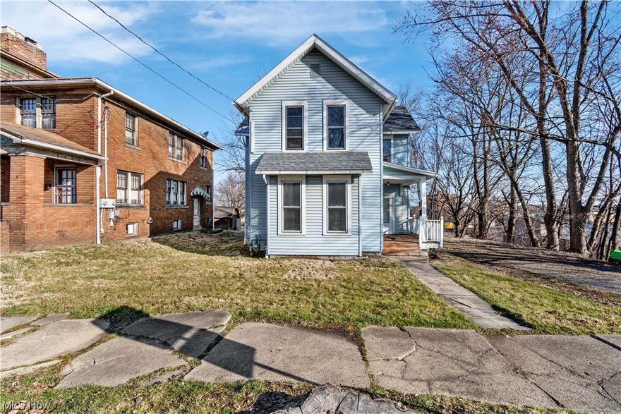 Great investment or owner/occupant opportunity! The move-in ready second floor 1-bedroom apartment is spacious with a large living room, bedroom, eat-in kitchen, and full bath. Previous rent was $650. An investor could rent out the upstairs apartment and renovate the lower unit OR an owner/occupant could move into the upstairs unit while renovating the lower unit. The bottom floor has 2 bedrooms, a large living room, a spacious dining room, kitchen, and full bath. Conveniently located near the library, bus stop, and near local dining and shopping. The driveway will fit two cars and there is ample street parking available. Priced to sell as is. Seller will make no repairs.