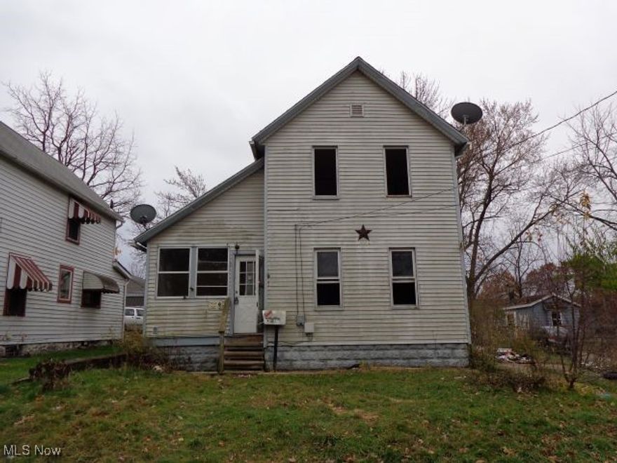 Welcome to 590 Flora Ave.  This is a 2 bedroom 1 bath colonial with a nice size front and back yard.  There is a deck with a fenced back yard.  Easy access to highways and nearby Portage Lakes with shopping and entertainment.  The property is sold As-Is, where-is.  Seller has no knowledge of condition.  Buyer should perform their due diligence and make own assessments.  Priced to sell.  Great opportunity for an investor!