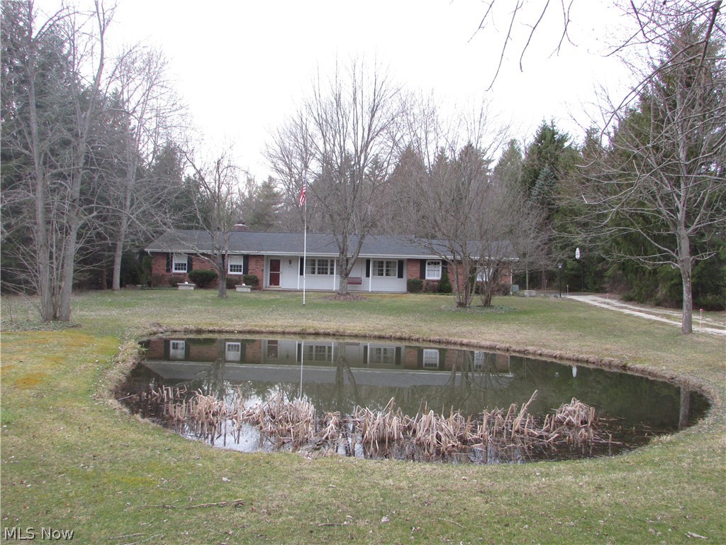 A true Richfield gem, this 3 bedroom 2.5 bath ranch sits on 1 1/4 acres of private land. The scenic lot has a pond in the front and is wooded to the rear. There is a wood burning fireplace in the family room that opens to a sun porch. The formal living room and dining room overlook the pond. There is a master suite that looks out into the wooded rear yard. There is an attached 2 car garage, new cistern, updated electric, and so much more.