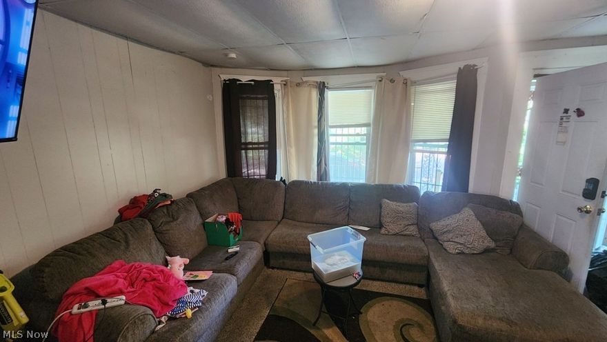 Large Colonial Home offers off street parking full basement ,  5 bedrooms 1 bath.  Formal dining room,  kitchen area along with galley kitchen and large living room.   Tenant occupied .