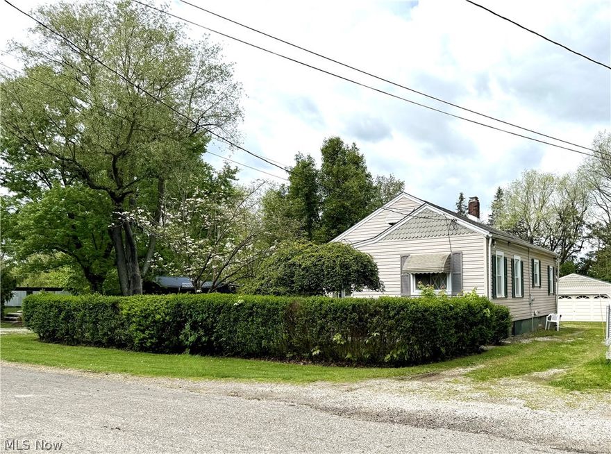 If you are looking for a starter home or looking to downsize to a home that is also move-in ready…. This is it! New AC & Furnace in 2024, HW tank in 2025, well pump in 2023, well bladder in 2024. Updates to electrical & plumbing in 2021.  The water softener is 3 years old. Windows were replaced in 2001.  Enclosed 3-season finished back porch! Bonus…finished attic! Great for extra storage, craft room, or playroom. 
Detached 2+ car garage with an attached covered cement patio. Large flat lot with mature landscaping and a backyard fire pit. This home is quietly tucked away on a dead-end street and
has been lovingly cared for.