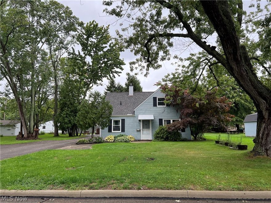 Enjoy this quiet neighborhood and beautiful sunsets with access to headlands park, Lake Erie and nearby boating. Most big ticket items have been recently updated/replaced. The furnace and A/C new 2020, electrical updates 2019, main house roof was replaced in 2011, garage roof including door and opener in 2020, all gutters new 2020, all new windows installed in 2019, newer heated wood like flooring installed 2015 in living/dining room and bedrooms, new bathroom flooring 2016. This property includes an additional parcel of land making this a double lot. That is one of the main features of this property and the square footage is exceptionally large for the area with rear family room addition. Owner recognizes having the washer and dry in kitchen is not ideal for everyone so they have had relocation options professionally evaluated and are willing to provide a credit to buyer should they choose to permanently move them. House power washed, carpets cleaned and ready for new owners special t